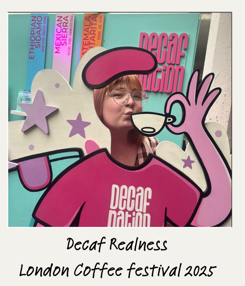 Chelsea Keetley drinking decaf at the Decaf Nation stand, London Coffee Festival 2025